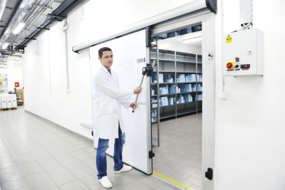 medical factory  supplies storage indoor with workers people